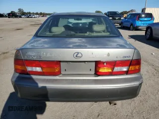 1997 Lexus ES 300 Luxury Sport Sdn with VIN JT8BF22GXV0055087, listed as a Copart auction lot 83823814 with 208,967 mi miles and Salvage Title. Bid and sale history available at carsss.com. Image 6.