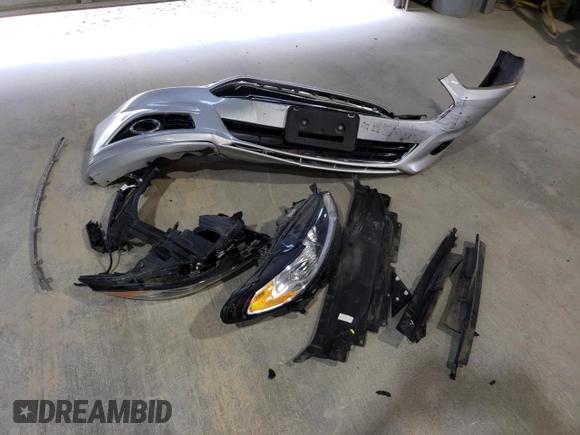 2016 Ford Fusion Titanium Hybrid with VIN 3FA6P0RUXGR355351, listed as a Copart auction lot 56516025 with 117,964 mi miles and Salvage title. Bid and sale history available at DreamBid. Image 12.