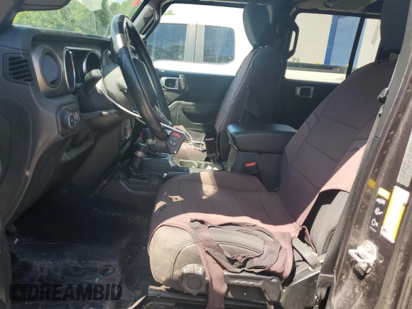 2020 Jeep Wrangler Unlimited Black and Tan with VIN 1C4HJXDGXLW221705, listed as a Copart auction lot 56224785 with 82,360 mi miles and Salvage title. Bid and sale history available at DreamBid. Image 7.