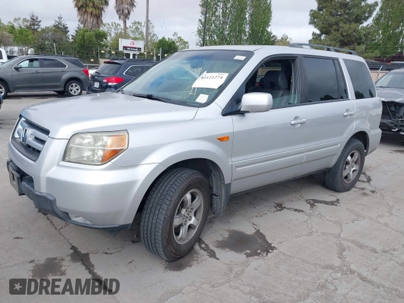 2006 Honda Pilot EX-L with VIN 2HKYF186X6H554433, listed as a IAAI auction lot 42111274 with 212,610 mi miles and . Bid and sale history available at DreamBid. Image 2.