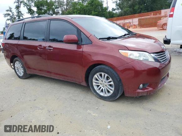 2015 Toyota Sienna XLE with VIN 5TDYK3DC4FS643881, listed as a Copart auction lot 56684635 with 137,781 mi miles and Salvage Title. Bid and sale history available at DreamBid. Image 4.