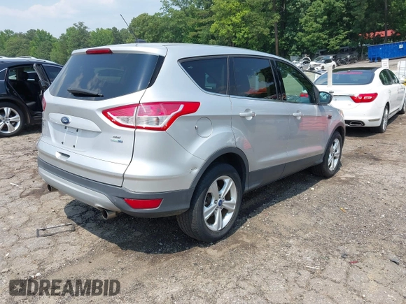 2013 Ford Escape SE z VIN 1FMCU9GX9DUB09981, wystawiony jako IAAI lot #42412927 z przebiegiem 150 499 mil mil oraz . Historia ofert i sprzedaży dostępna na DreamBid. Obrazek 4.