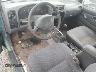 1996 Nissan Frontier XE with VIN 1N6SD16SXTC322219, listed as a Copart auction lot 49043685 with 102,964 mi miles and Salvage title. Bid and sale history available at DreamBid. Image 9.