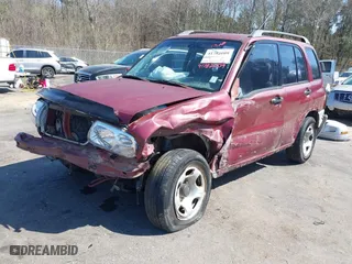 2000 Suzuki Grand Vitara with VIN JS3TE62V5Y4102944, listed as a IAAI auction lot 41782009 with 179,765 mi miles. Bid and sale history available at carsss.com. Image 6.