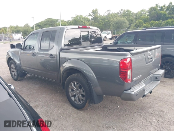 2020 Nissan Frontier SV with VIN 1N6ED0EA3LN715094, listed as a IAAI auction lot 42394885 with 26,576 mi miles and . Bid and sale history available at DreamBid. Image 3.