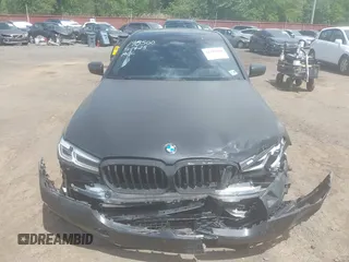 2023 BMW 5 Series M550i xDrive with VIN WBA13BK02PCN47443, listed as a IAAI auction lot 42290388 with Not provided miles and . Bid and sale history available at DreamBid. Image 12.