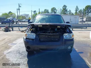 2006 Ford Escape XLT with VIN 1FMCU03116KB57387, listed as a IAAI auction lot 41813041 with 180,417 mi miles. Bid and sale history available at carsss.com. Image 13.