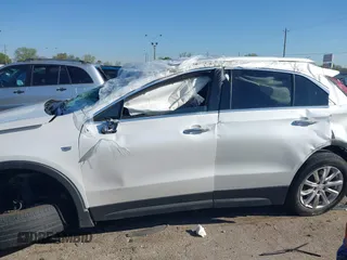 2022 Cadillac XT4 FWD Luxury with VIN 1GYAZAR48NF170949, listed as a IAAI auction lot 41857671 with 25,881 mi miles and . Bid and sale history available at carsss.com. Image 14.