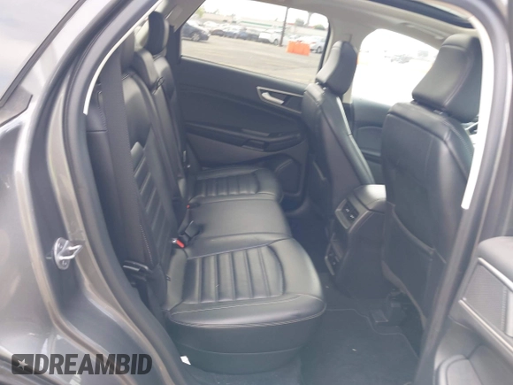 2023 Ford Edge SEL z VIN 2FMPK4J98PBA03830, wystawiony jako IAAI lot #41992054 z przebiegiem 21 081 mil mil oraz . Historia ofert i sprzedaży dostępna na DreamBid. Obrazek 8.