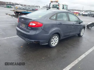 2012 Ford Fiesta SE with VIN 3FADP4BJ0CM155729, listed as a IAAI auction lot 41800447 with 90,091 mi miles. Bid and sale history available at carsss.com. Image 4.