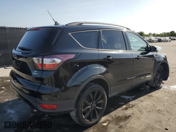 2018 Ford Escape SE z VIN 1FMCU9GD5JUB84551, wystawiony jako Copart lot #54515495 z przebiegiem 73 280 mil mil oraz Szkoda całkowita • Salvage title. Historia ofert i sprzedaży dostępna na DreamBid. Obrazek 3.