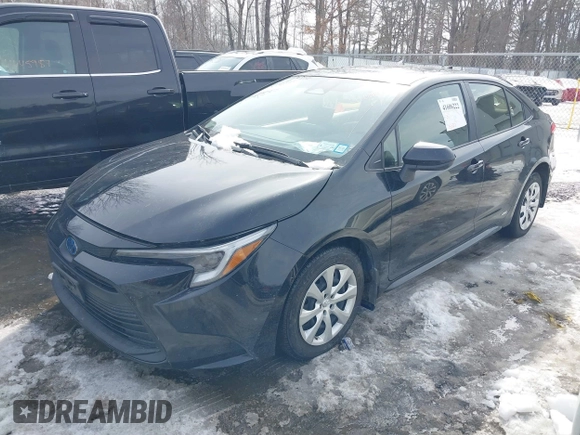 2023 Toyota Corolla Hybrid LE with VIN JTDBDMHE7P3004396, listed as a IAAI auction lot 41606222 with 15,037 mi miles. Bid and sale history available at carsss.com. Image 17.