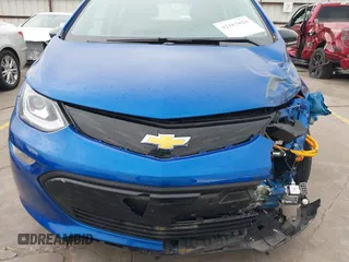 2017 Chevrolet Bolt EV LT z VIN 1G1FW6S09H4177071, wystawiony jako IAAI lot #42163824 z przebiegiem 65 327 mil mil oraz . Historia ofert i sprzedaży dostępna na DreamBid. Obrazek 6.