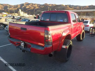 2014 Toyota Tacoma PreRunner with VIN 5TFJU4GN4EX060590, listed as a IAAI auction lot 41258506 with 137,939 mi miles. Bid and sale history available at carsss.com. Image 4.