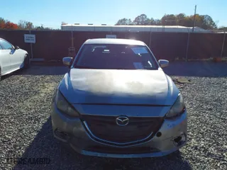 2016 Mazda Mazda3 i Sport with VIN JM1BM1U71G1315193, listed as a IAAI auction lot 41093477 with 214,069 mi miles. Bid and sale history available at carsss.com. Image 12.