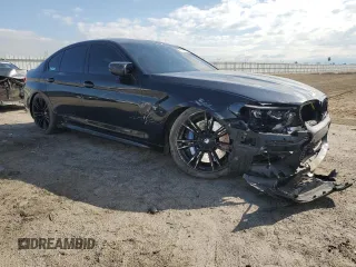 2019 BMW M5 z VIN WBSJF0C53KB447108, wystawiony jako Copart lot #51024275 z przebiegiem 58 387 mil mil oraz Szkoda całkowita • Salvage title. Historia ofert i sprzedaży dostępna na DreamBid. Obrazek 4.