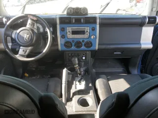 2011 Toyota FJ Cruiser with VIN JTEBU4BF1BK102982, listed as a Copart auction lot 47958985 with 215,418 mi miles and Salvage Title. Bid and sale history available at carsss.com. Image 8.