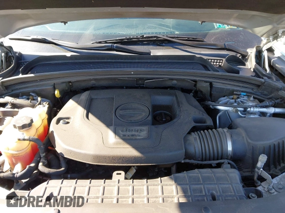2021 Jeep Grand Cherokee Overland with VIN 1C4RJKDG0M8122002, listed as a IAAI auction lot 41748944 with 88,336 mi miles and . Bid and sale history available at DreamBid. Image 10.