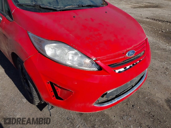 2012 Ford Fiesta SE with VIN 3FADP4BJ3CM155725, listed as a IAAI auction lot 41795297 with 128,517 mi miles. Bid and sale history available at carsss.com. Image 6.