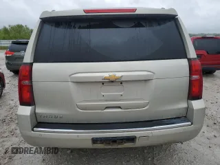 2015 Chevrolet Tahoe LTZ z VIN 1GNSKCKC5FR100084, wystawiony jako Copart lot #57677825 z przebiegiem 141 987 mil mil oraz Czysty tytuł • Clean title. Historia ofert i sprzedaży dostępna na DreamBid. Obrazek 6.
