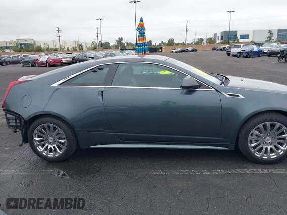 2011 Cadillac CTS Performance with VIN 1G6DJ1ED7B0126314, listed as a IAAI auction lot 42185363 with 80,676 mi miles and . Bid and sale history available at DreamBid. Image 13.