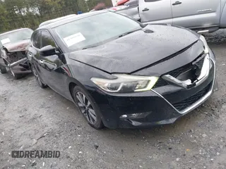 2016 Nissan Maxima SV z VIN 1N4AA6AP6GC400496, wystawiony jako IAAI lot #41908190 z przebiegiem 149 984 mil mil oraz . Historia ofert i sprzedaży dostępna na DreamBid. Obrazek 1.