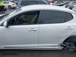 2014 Kia Optima Hybrid LX with VIN KNAGM4AD8E5067173, listed as a IAAI auction lot 41937734 with 121,209 mi miles. Bid and sale history available at carsss.com. Image 14.