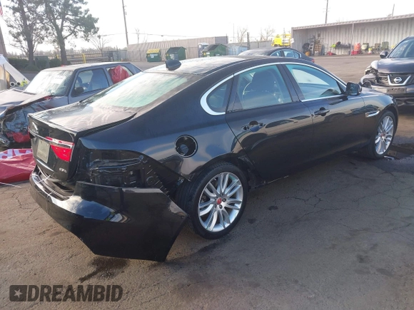 2018 Jaguar XF with VIN SAJBE4EV4JCY56439, listed as a IAAI auction lot 41390873 with 59,599 mi miles and . Bid and sale history available at DreamBid. Image 4.