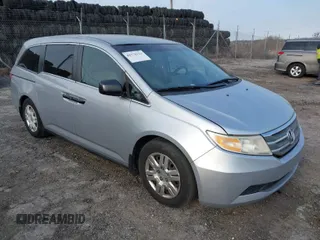 2013 Honda Odyssey LX with VIN 5FNRL5H22DB028827, listed as a IAAI auction lot 41775121 with 211,205 mi miles and . Bid and sale history available at carsss.com. Image 1.