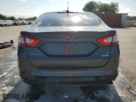 2015 Ford Fusion SE z VIN 3FA6P0HDXFR108055, wystawiony jako Copart lot #54801165 z przebiegiem 99 728 mil mil oraz Szkoda całkowita • Salvage title. Historia ofert i sprzedaży dostępna na DreamBid. Obrazek 6.