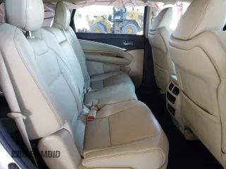 2019 Acura MDX Technology z VIN 5J8YD3H50KL001807, wystawiony jako Copart lot #87128534 z przebiegiem 55 954 mil mil oraz Nie do naprawy • Non repairable. Historia ofert i sprzedaży dostępna na DreamBid. Obrazek 11.