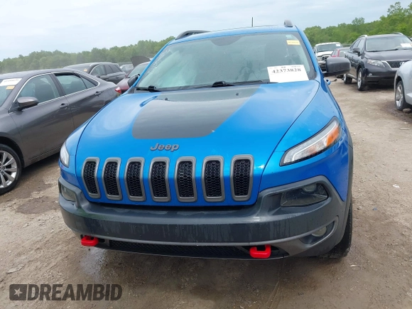 2017 Jeep Cherokee Trailhawk with VIN 1C4PJMBS2HW612792, listed as a IAAI auction lot 42373828 with 74,106 mi miles and . Bid and sale history available at DreamBid. Image 12.