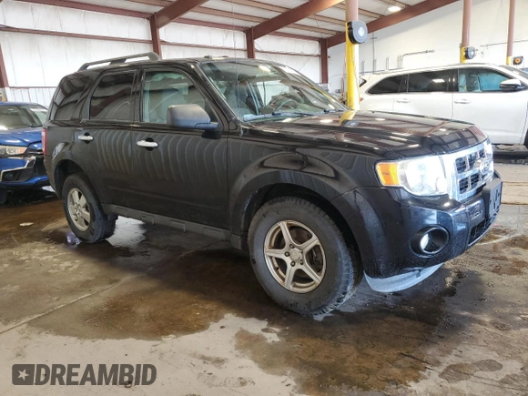 2012 Ford Escape XLT with VIN 1FMCU9D71CKC27621, listed as a Copart auction lot 62741115 with 128,254 mi miles and Salvage title. Bid and sale history available at DreamBid. Image 4.