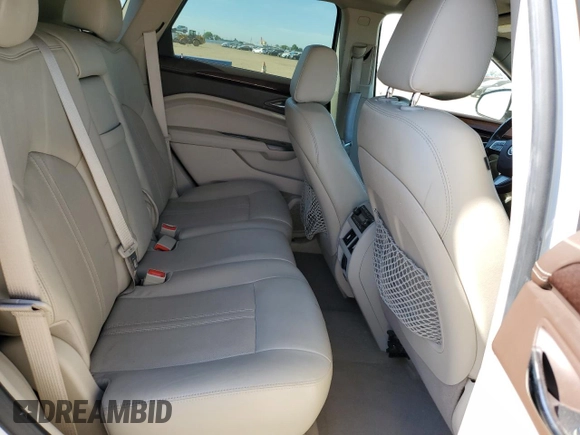 2012 Cadillac SRX Premium Collection с VIN 3GYFNFE30CS534835, выставлен на аукционе Copart как лот 63681235 с пробегом 124 964 миль миль и Списание • Salvage title. История ставок и продаж доступна на DreamBid. Изображение 11.