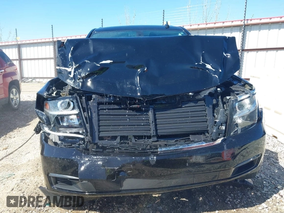 2020 Chevrolet Tahoe LS with VIN 1GNSCAKC6LR293472, listed as a IAAI auction lot 42014584 with 56,549 mi miles and . Bid and sale history available at DreamBid. Image 12.
