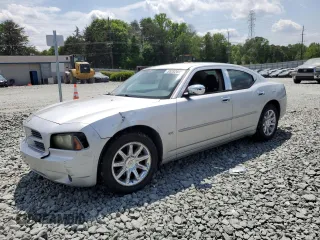 2006 Dodge Charger z VIN 2B3KA43G96H162897, wystawiony jako Copart lot #55282695 z przebiegiem 185 749 mil mil oraz Szkoda całkowita • Salvage title. Historia ofert i sprzedaży dostępna na DreamBid. Obrazek 1.