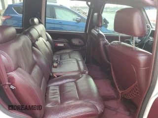 1998 Chevrolet Tahoe z VIN 1GNEK13R7WJ340188, wystawiony jako Copart lot #52177815 z przebiegiem 217 850 mil mil oraz Szkody całkowita. Historia ofert i sprzedaży dostępna na DreamBid. Obrazek 12.
