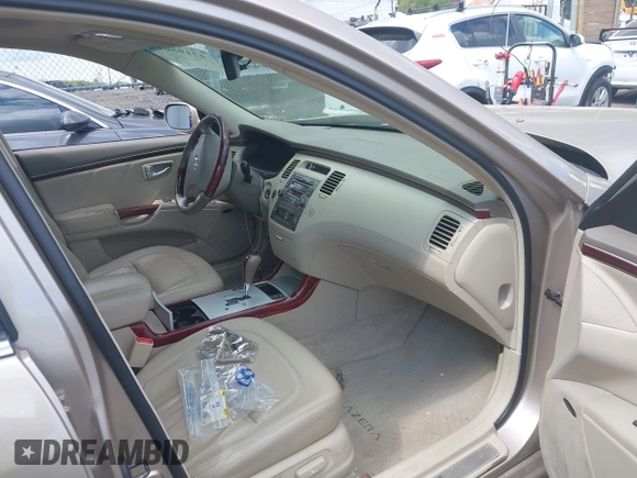 2006 Hyundai Azera SE with VIN KMHFC46FX6A125848, listed as a IAAI auction lot 42195041 with 147,596 mi miles and . Bid and sale history available at DreamBid. Image 5.