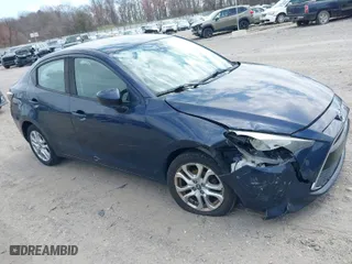 2017 Toyota Yaris iA with VIN 3MYDLBYV5HY169342, listed as a IAAI auction lot 41919676 with 100,893 mi miles. Bid and sale history available at carsss.com. Image 1.