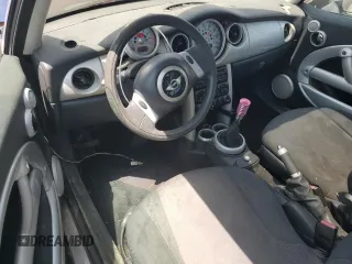 2004 MINI Hardtop z VIN WMWRC334X4TC51451, wystawiony jako Copart lot #61268235 z przebiegiem 149 750 mil mil oraz Szkoda całkowita • Salvage title. Historia ofert i sprzedaży dostępna na DreamBid. Obrazek 8.