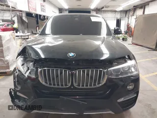 2015 BMW X4 xDrive28i z VIN 5UXXW3C59F0M87082, wystawiony jako IAAI lot #41839047 z przebiegiem 142 081 mil mil oraz . Historia ofert i sprzedaży dostępna na DreamBid. Obrazek 12.
