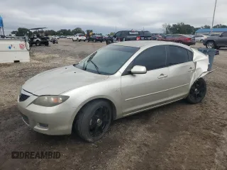 2008 Mazda 3 i Sport with VIN JM1BK12F181790912, listed as a Copart auction lot 79189674 with 289,265 mi miles and Salvage Title. Bid and sale history available at DreamBid. Image 1.