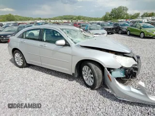 2010 Chrysler Sebring Limited with VIN 1C3CC5FDXAN162044, listed as a Copart auction lot 56789075 with Not provided miles and Non repairable. Bid and sale history available at DreamBid. Image 4.