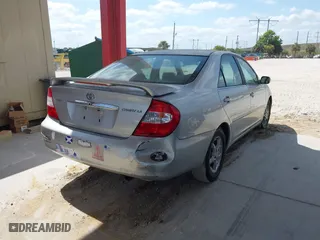 2002 Toyota Camry LE with VIN 4T1BE32K92U554994, listed as a IAAI auction lot 42095207 with 272,777 mi miles. Bid and sale history available at carsss.com. Image 4.