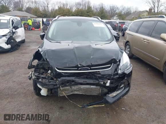 2016 Ford Escape Titanium with VIN 1FMCU0J91GUC69895, listed as a IAAI auction lot 41488171 with 162,232 mi miles. Bid and sale history available at carsss.com. Image 13.