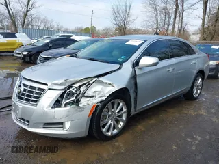 2013 Cadillac XTS Premium with VIN 2G61S5S36D9111444, listed as a IAAI auction lot 41558500 with 101,223 mi miles. Bid and sale history available at carsss.com. Image 2.