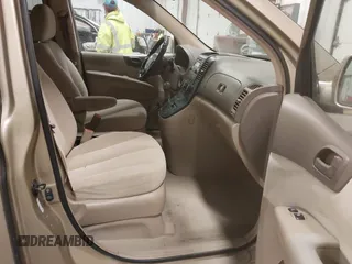 2007 Kia Sedona EX with VIN KNDMB233576160010, listed as a IAAI auction lot 41666497 with 206,834 mi miles. Bid and sale history available at carsss.com. Image 5.