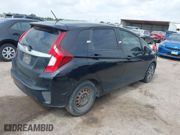 2015 Honda Fit EX-L z VIN 3HGGK5H81FM723962, wystawiony jako IAAI lot #42455367 z przebiegiem 104 859 mil mil oraz . Historia ofert i sprzedaży dostępna na DreamBid. Obrazek 4.