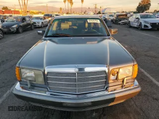 1988 Mercedes-Benz 560 with VIN WDBCA39D4JA391164, listed as a Copart auction lot 82628704 with 88,482 mi miles and Clean Title. Bid and sale history available at DreamBid. Image 5.
