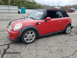 2011 MINI Convertible with VIN WMWZN3C51BTZ78331, listed as a Copart auction lot 73348304 with 94,219 mi miles and Salvage Title. Bid and sale history available at DreamBid. Image 1.